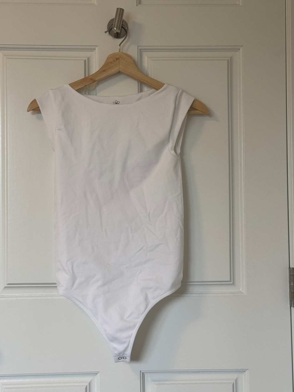 NWOT Aura White Sleeveless One-Piece Bodysuit